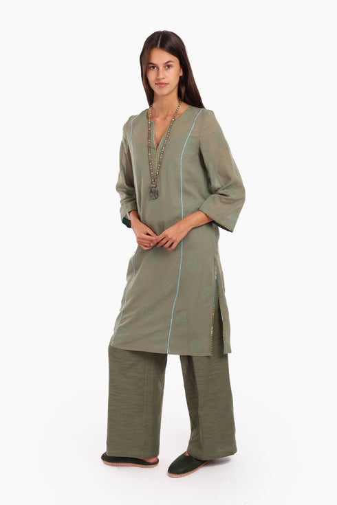 Embroidery tunic with contrast color piping in printed cotton voile